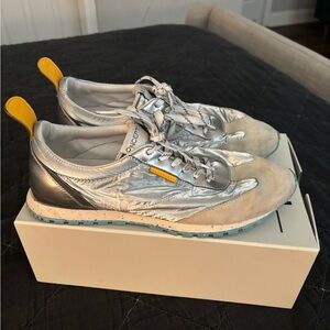 Sleek Silver and Yellow Sneakers with Reflective Finish